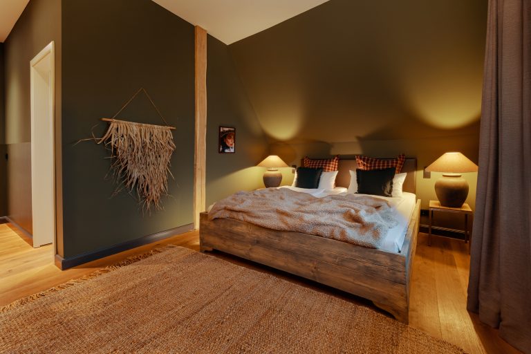 Room No.6: Double bed with wall hanging, Hof Bissee
