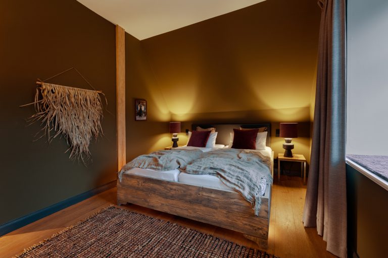 Room No.9: Double bed with wall hanging, Hof Bissee