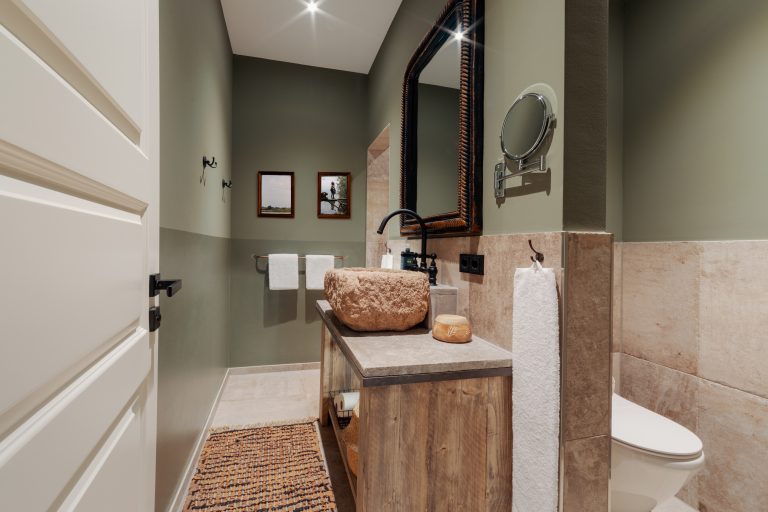 Room No.8: Bathroom with stone sink and toilet, Hof Bissee