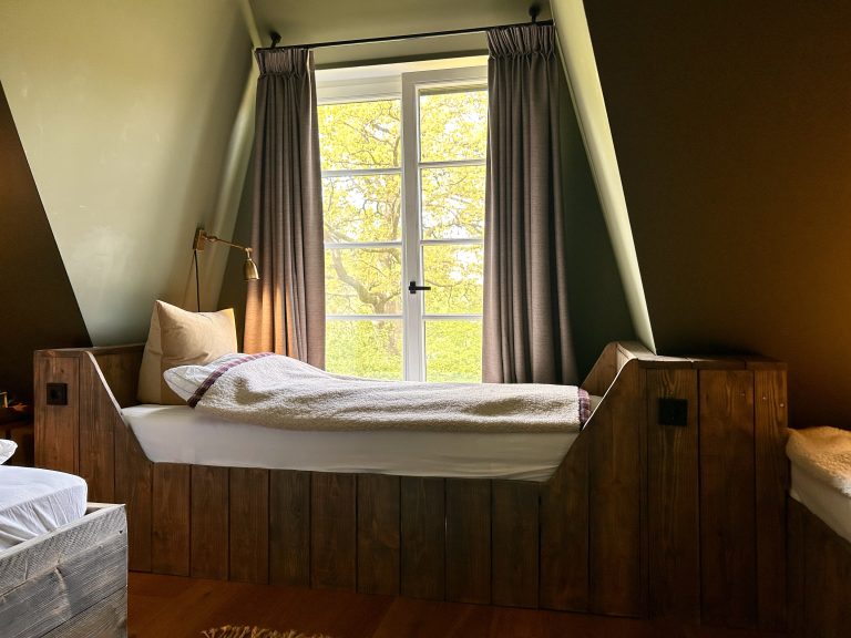 Room No.8: Wooden bed by the window, Hof Bissee