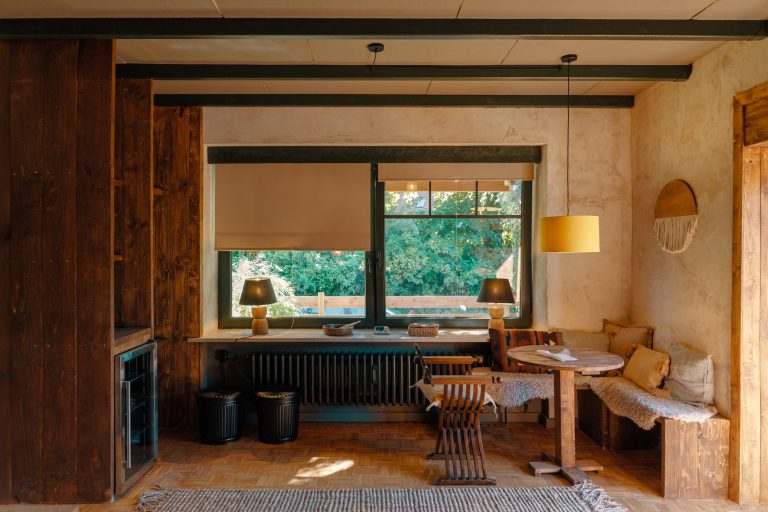 Cabin No.5: Dining area by the window with wooden furniture, Hof Bissee