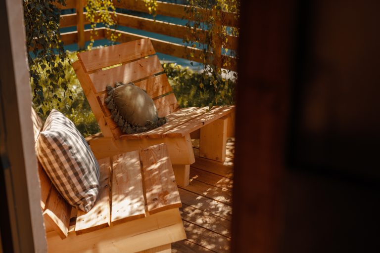 Cabin No.5: Wooden sun loungers on the sunny terrace, Hof Bissee