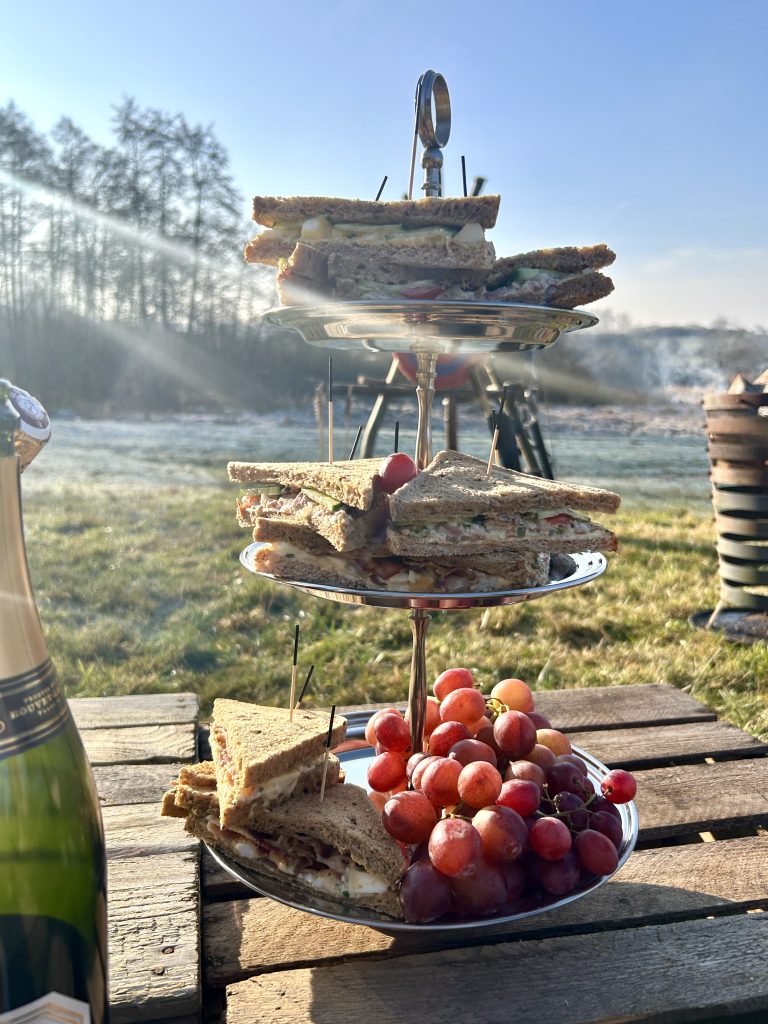 Corporate events & conferences: Tiered stand with snacks and fruit outdoors, Hof Bissee