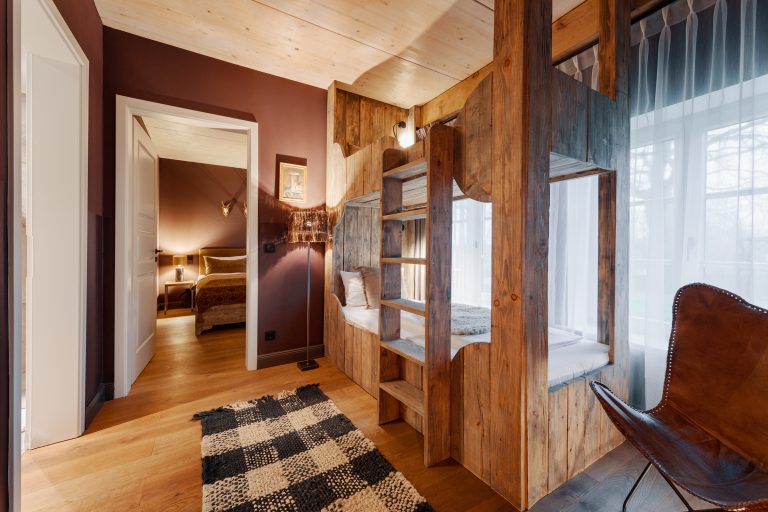 Room No.3: View of the room with the wooden bunk bed, Hof Bissee