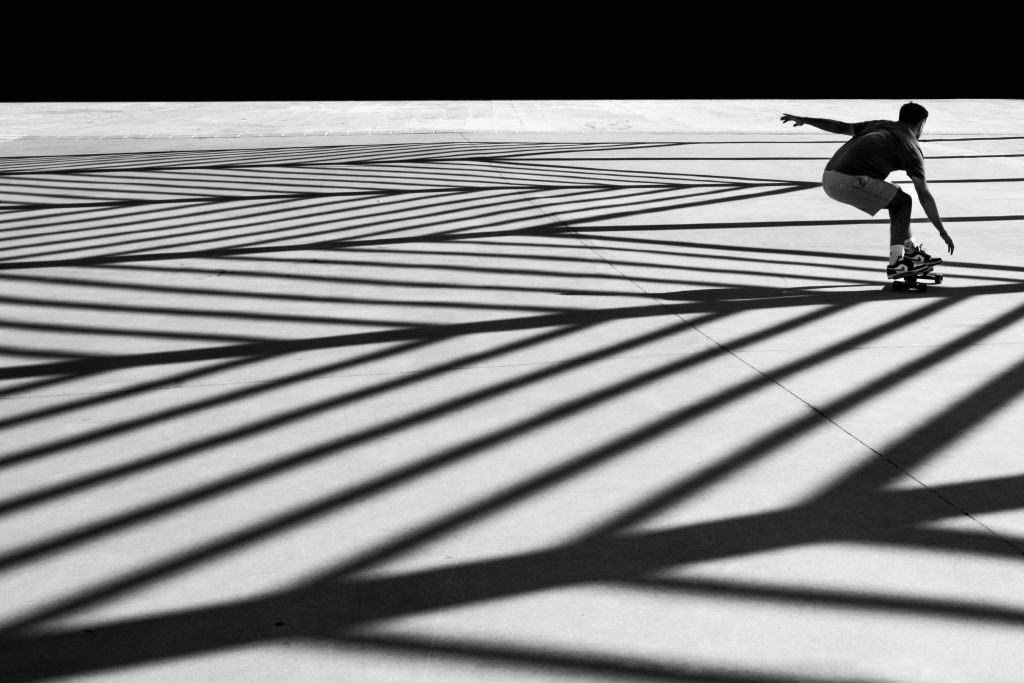Art exhibition SVENSØN: Skateboarder in a pattern of shadows, Hof Bissee